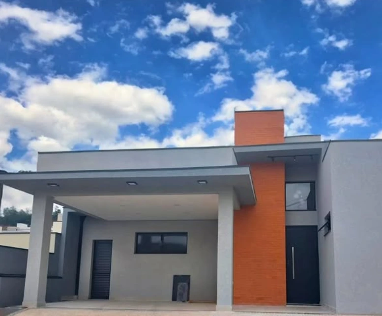 Fachada moderna com portas e janelas de alumínio em acabamento escuro — Portal Prime